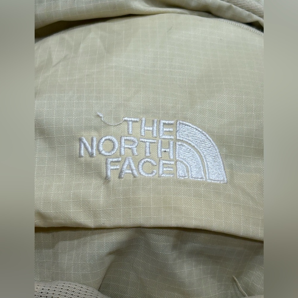 North face back pack cream color
